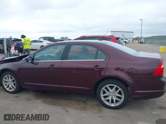 2012 Ford Fusion SEL with VIN 3FAHP0JA9CR441531, listed as a IAAI auction lot 42673000 with 153,928 mi miles and . Bid and sale history available at DreamBid. Image 14.