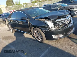 2014 Cadillac XTS Luxury with VIN 2G61M5S31E9290150, listed as a IAAI auction lot 41653055 with 174,553 mi miles. Bid and sale history available at carsss.com. Image 1.