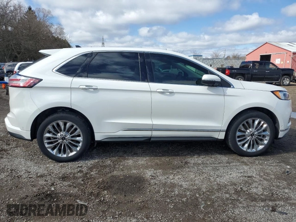 2021 Ford Edge Titanium z VIN 2FMPK4K93MBA52444, wystawiony jako Copart lot #51752835 z przebiegiem 67 137 mil mil oraz Czysty tytuł • Clean title. Historia ofert i sprzedaży dostępna na DreamBid. Obrazek 3.