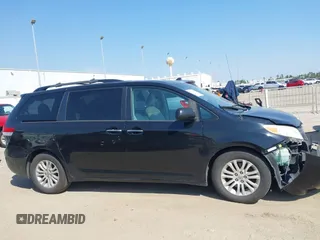 2014 Toyota Sienna XLE with VIN 5TDYK3DC2ES492554, listed as a IAAI auction lot 41685109 with 196,619 mi miles and . Bid and sale history available at DreamBid. Image 13.