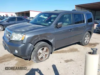 2011 Honda Pilot EX-L with VIN 5FNYF3H64BB056071, listed as a IAAI auction lot 41841047 with 112,114 mi miles and . Bid and sale history available at carsss.com. Image 17.