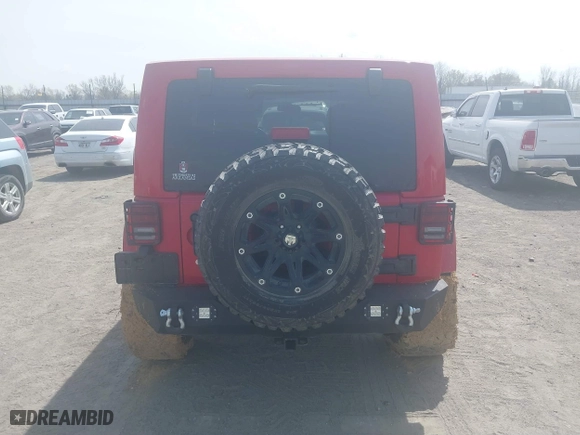 2012 Jeep Wrangler Unlimited Sahara with VIN 1C4HJWEGXCL209449, listed as a IAAI auction lot 41864432 with 100,917 mi miles. Bid and sale history available at carsss.com. Image 16.