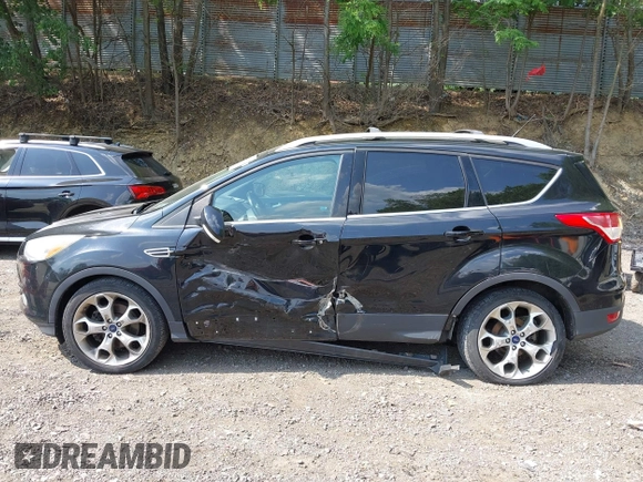 2016 Ford Escape Titanium with VIN 1FMCU9JX1GUC18335, listed as a IAAI auction lot 42396492 with 147,522 mi miles and . Bid and sale history available at DreamBid. Image 14.