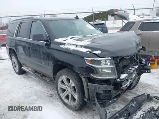 2016 Chevrolet Tahoe LT with VIN 1GNSKBKC5GR413972, listed as a IAAI auction lot 41559646 with 141,708 mi miles and . Bid and sale history available at DreamBid. Image 1.