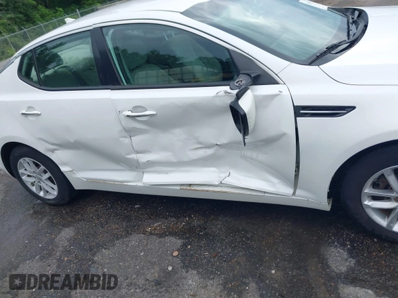 2013 Kia Optima LX z VIN KNAGM4A72D5366828, wystawiony jako IAAI lot #42106525 z przebiegiem 159 564 mil mil oraz . Historia ofert i sprzedaży dostępna na DreamBid. Obrazek 13.