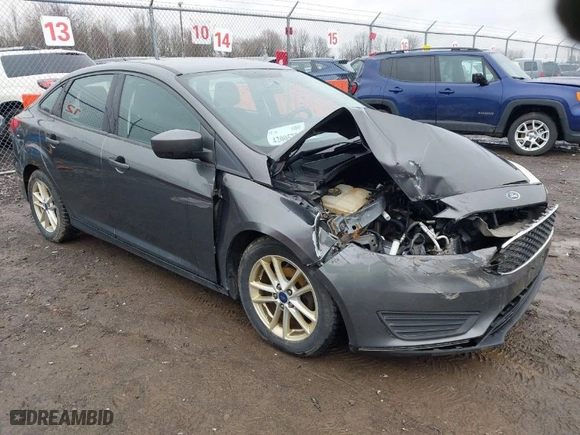 2018 Ford Focus SE with VIN 1FADP3F23JL298265, listed as a IAAI auction lot 42005754 with 134,721 mi miles. Bid and sale history available at carsss.com. Image 1.