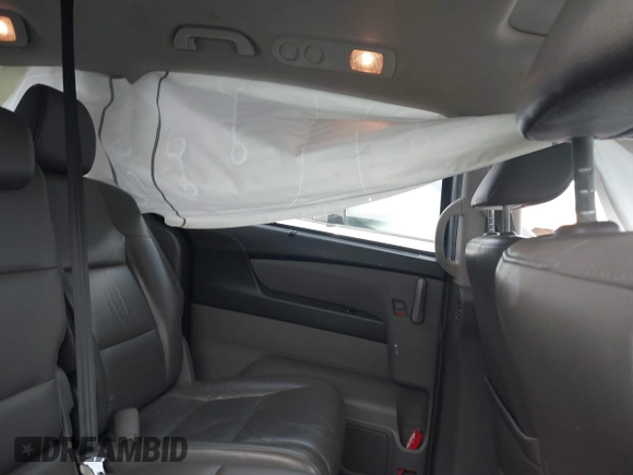 2012 Honda Odyssey EX-L with VIN 5FNRL5H66CB069916, listed as a IAAI auction lot 41935248 with 230,204 mi miles and . Bid and sale history available at carsss.com. Image 8.