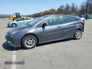 2017 Toyota Prius Two z VIN JTDKBRFU3H3028063, wystawiony jako Copart lot #54358195 z przebiegiem 129 331 mil mil oraz Szkoda całkowita • Salvage title. Historia ofert i sprzedaży dostępna na DreamBid. Obrazek 1.