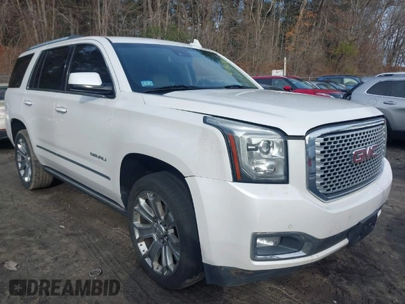2016 GMC Yukon Denali with VIN 1GKS2CKJ9GR334645, listed as a IAAI auction lot 41781040 with 141,405 mi miles. Bid and sale history available at carsss.com. Image 1.