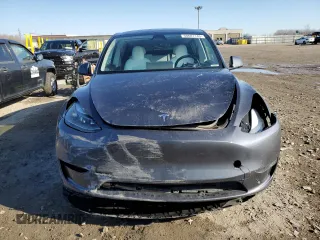 2023 Tesla Model Y Long Range z VIN 7SAYGDEE0PA206005, wystawiony jako Copart lot #50681145 z przebiegiem 31 989 mil mil oraz Szkoda całkowita • Salvage title. Historia ofert i sprzedaży dostępna na DreamBid. Obrazek 5.