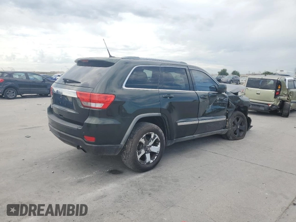 2011 Jeep Grand Cherokee Laredo z VIN 1J4RR4GG1BC520579, wystawiony jako Copart lot #60860794 z przebiegiem 196 271 mil mil oraz Szkoda całkowita • Salvage title. Historia ofert i sprzedaży dostępna na DreamBid. Obrazek 3.