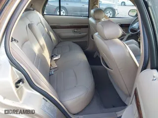 1999 Mercury Grand Marquis LS with VIN 2MEFM75W1XX703878, listed as a IAAI auction lot 42074187 with 56,962 mi miles. Bid and sale history available at carsss.com. Image 8.