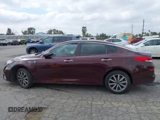 2019 Kia Optima LX z VIN 5XXGT4L37KG354649, wystawiony jako IAAI lot #42130410 z przebiegiem 61 315 mil mil oraz . Historia ofert i sprzedaży dostępna na DreamBid. Obrazek 13.