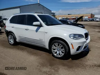 2012 BMW X5 35i z VIN 5UXZV4C59CL759335, wystawiony jako Copart lot #57055065 z przebiegiem 180 589 mil mil oraz Czysty tytuł • Clean title. Historia ofert i sprzedaży dostępna na DreamBid. Obrazek 4.