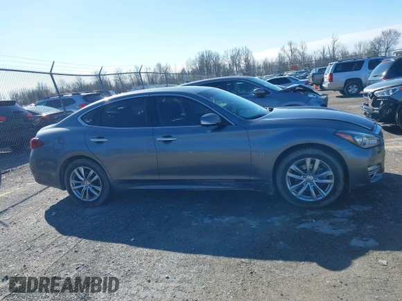 2018 Infiniti Q70 Luxe with VIN JN1BY1AR3JM220783, listed as a IAAI auction lot 41480241 with 95,739 mi miles and . Bid and sale history available at DreamBid. Image 13.
