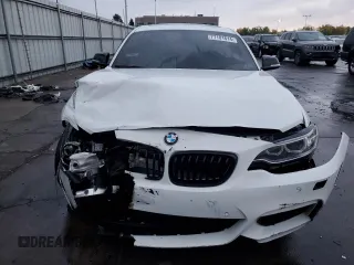 2017 BMW 2 Series M240i xDrive with VIN WBA2G3C30HV641463, listed as a Copart auction lot 77101614 with 76,571 mi miles and Salvage Title. Bid and sale history available at carsss.com. Image 5.