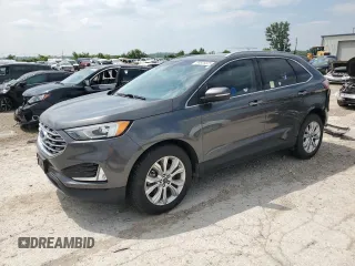 2020 Ford Edge Titanium with VIN 2FMPK4K97LBA11619, listed as a Copart auction lot 59505825 with 87,506 mi miles and Salvage title. Bid and sale history available at DreamBid. Image 1.