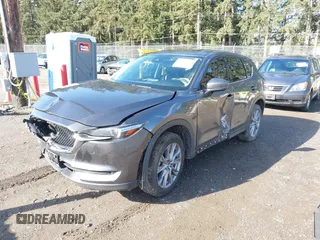 2019 Mazda CX-5 Grand Touring with VIN JM3KFBDM3K1677208, listed as a IAAI auction lot 41929299 with 58,163 mi miles. Bid and sale history available at carsss.com. Image 17.