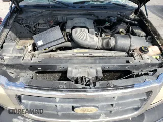 2000 Ford F-150 with VIN 2FTRX18W0YCA13563, listed as a Copart auction lot 55809785 with Not provided miles and Non repairable. Bid and sale history available at DreamBid. Image 11.