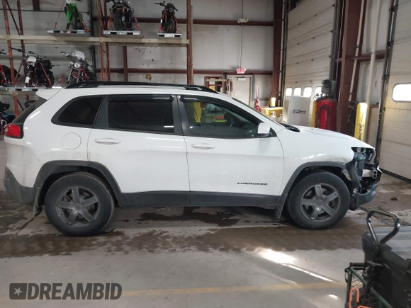 2014 Jeep Cherokee Latitude with VIN 1C4PJMCS5EW288909, listed as a IAAI auction lot 41531117 with 108,971 mi miles and . Bid and sale history available at DreamBid. Image 13.