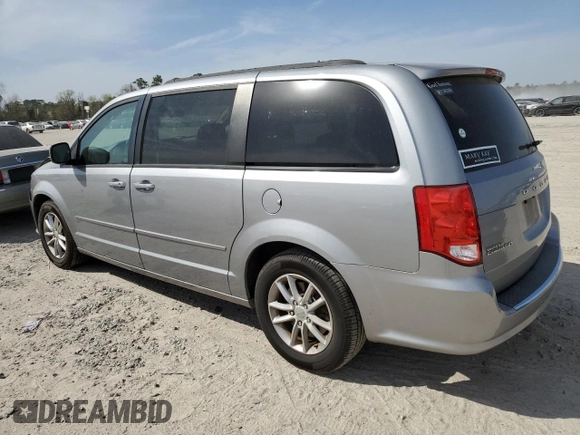 2014 Dodge Grand Caravan SXT with VIN 2C4RDGCG2ER273533, listed as a Copart auction lot 49228495 with 124,070 mi miles and Salvage Title. Bid and sale history available at DreamBid. Image 2.