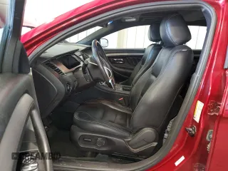 2015 Ford Taurus SEL with VIN 1FAHP2E83FG143653, listed as a Copart auction lot 59280645 with 77,048 mi miles and Salvage title. Bid and sale history available at DreamBid. Image 7.