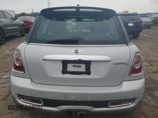 2011 MINI Hardtop S with VIN WMWSV3C58BTY11580, listed as a Copart auction lot 62081615 with 112,336 mi miles and Salvage title. Bid and sale history available at DreamBid. Image 6.