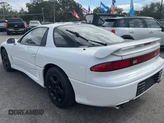 1992 Mitsubishi 3000GT z VIN JA3XE74CXNY058167, wystawiony jako Copart lot #84192254 z przebiegiem 69 411 mil mil oraz Tytuł czysty. Historia ofert i sprzedaży dostępna na DreamBid. Obrazek 3.