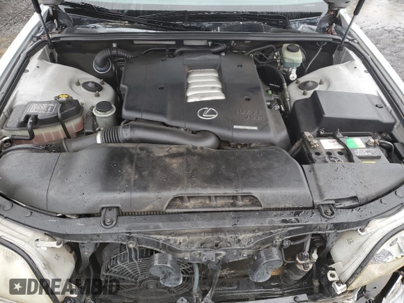2000 Lexus LS 400 z VIN JT8BH28F8Y0168520, wystawiony jako Copart lot #87434874 z przebiegiem 149 846 mil mil oraz Szkoda całkowita • Salvage title. Historia ofert i sprzedaży dostępna na DreamBid. Obrazek 11.