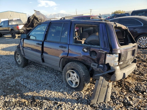 1997 Jeep Grand Cherokee Laredo with VIN 1J4GZ58Y0VC547880, listed as a Copart auction lot 79866684 with 0 mi miles and Salvage Title. Bid and sale history available at carsss.com. Image 2.