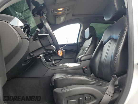 2012 Cadillac SRX Performance Collection with VIN 3GYFNBE33CS540914, listed as a Copart auction lot 54787125 with 130,357 mi miles and Salvage title. Bid and sale history available at DreamBid. Image 7.