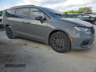 2021 Chrysler Pacifica Touring L with VIN 2C4RC1BG9MR607542, listed as a Copart auction lot 51305855 with 49,642 mi miles and Salvage Title. Bid and sale history available at DreamBid. Image 4.