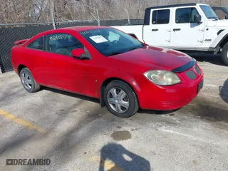 2009 Pontiac G5 with VIN 1G2AS18H097148690, listed as a IAAI auction lot 41801507 with 156,328 mi miles. Bid and sale history available at carsss.com. Image 1.