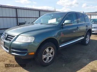 2004 Volkswagen Touareg with VIN WVGEM77L54D061132, listed as a IAAI auction lot 42127905 with 146,801 mi miles and . Bid and sale history available at DreamBid. Image 2.