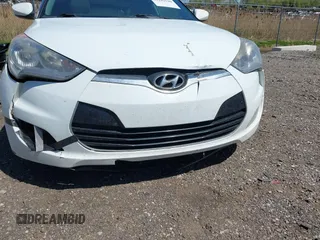 2013 Hyundai Veloster w/Gray Int with VIN KMHTC6AD1DU165476, listed as a IAAI auction lot 42242540 with 201,732 mi miles and . Bid and sale history available at DreamBid. Image 6.