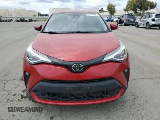2021 Toyota C-HR LE z VIN JTNKHMBX2M1104830, wystawiony jako Copart lot #54757285 z przebiegiem 142 356 mil mil oraz Szkody całkowita. Historia ofert i sprzedaży dostępna na DreamBid. Obrazek 5.