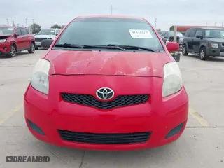 2009 Toyota Yaris with VIN JTDKT903295244022, listed as a IAAI auction lot 41615570 with 165,964 mi miles. Bid and sale history available at carsss.com. Image 12.