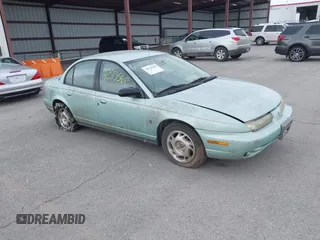1996 Saturn SL с VIN 1G8ZK5277TZ340863, выставлен на аукционе IAAI как лот 42513568 с пробегом 130 286 миль миль и . История ставок и продаж доступна на DreamBid. Изображение 1.