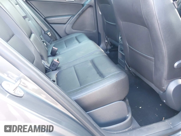 2013 Volkswagen Tiguan S with VIN WVGAV3AX7DW624136, listed as a IAAI auction lot 42256657 with 124,000 mi miles and . Bid and sale history available at DreamBid. Image 8.