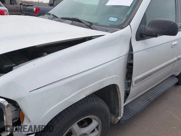 2003 GMC Envoy SLE with VIN 1GKDS13S532253648, listed as a IAAI auction lot 41850094 with 147,254 mi miles. Bid and sale history available at carsss.com. Image 12.