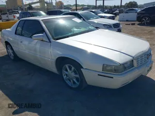 1999 Cadillac Eldorado Touring with VIN 1G6ET1290XU610405, listed as a IAAI auction lot 41967911 with 78,879 mi miles and . Bid and sale history available at DreamBid. Image 1.