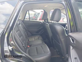 2013 Mazda CX-5 Grand Touring with VIN JM3KE4DE6D0148030, listed as a IAAI auction lot 42082947 with 119,432 mi miles and . Bid and sale history available at DreamBid. Image 8.