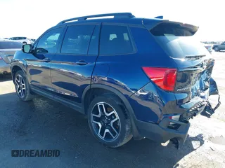 2023 Honda Passport Elite with VIN 5FNYF8H06PB012234, listed as a IAAI auction lot 41208146 with 38,491 mi miles and . Bid and sale history available at DreamBid. Image 3.