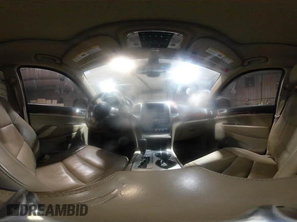 2011 Jeep Grand Cherokee Limited z VIN 1J4RR5GG7BC612091, wystawiony jako IAAI lot #41878511 z przebiegiem 127 114 mil mil oraz . Historia ofert i sprzedaży dostępna na DreamBid. Obrazek 21.