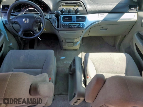 2007 Honda Odyssey EX with VIN 5FNRL38437B068697, listed as a Copart auction lot 60875505 with 211,688 mi miles and Salvage title. Bid and sale history available at DreamBid. Image 8.