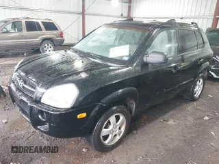 2005 Hyundai Tucson GL with VIN KM8JM12B75U072080, listed as a IAAI auction lot 41779464 with 191,771 mi miles. Bid and sale history available at carsss.com. Image 2.