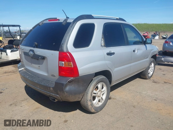 2006 Kia Sportage LX with VIN KNDJE723467202880, listed as a IAAI auction lot 41828141 with 263,068 mi miles and . Bid and sale history available at DreamBid. Image 4.