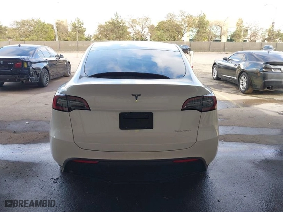2023 Tesla Model Y Long Range with VIN 7SAYGAEE0PF787216, listed as a IAAI auction lot 41589954 with 17,985 mi miles. Bid and sale history available at carsss.com. Image 17.