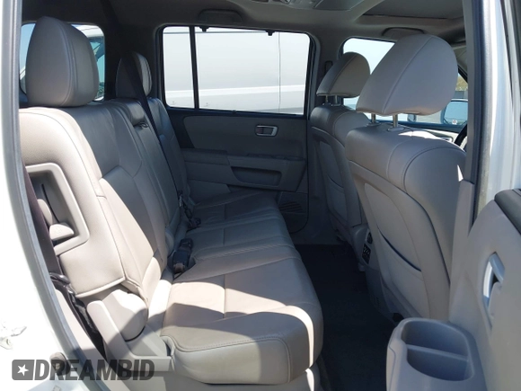 2013 Honda Pilot Touring with VIN 5FNYF4H92DB031589, listed as a IAAI auction lot 42159313 with 192,604 mi miles and . Bid and sale history available at carsss.com. Image 8.