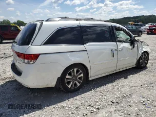 2014 Honda Odyssey Touring with VIN 5FNRL5H98EB053486, listed as a Copart auction lot 58004225 with 201,526 mi miles and Salvage title. Bid and sale history available at DreamBid. Image 3.
